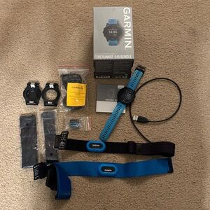 Garmin Forerunner 945 with Blue and Black Accessories